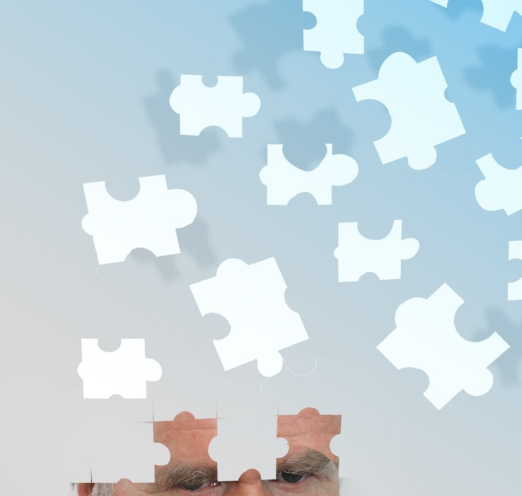 adult forehead emitting puzzle pieces in place of a "thought bubble"